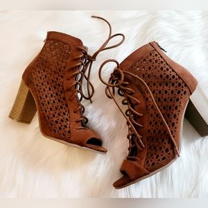 Size 7 Qupid brand peep toe lace up bootie
